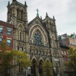 a large brick building with a clock tower