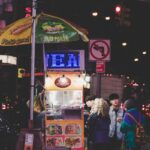 four people buying food