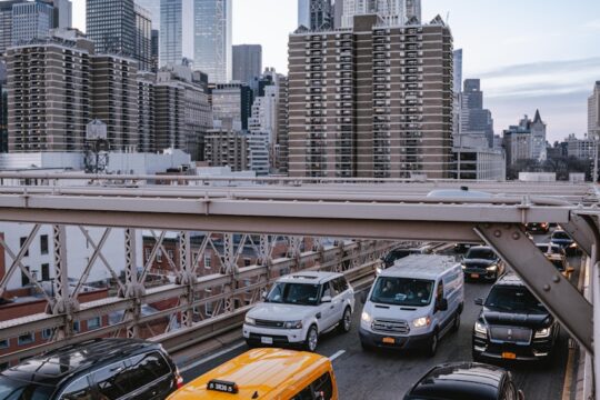 a city street filled with lots of traffic