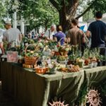 people beside assorted plants on table