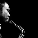 man playing saxophone