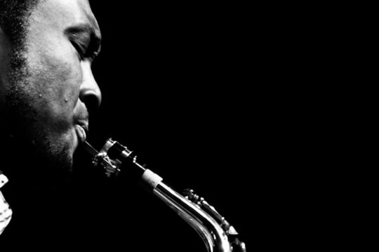 man playing saxophone